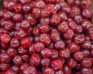 Heap of red dried Chinese plum (Prunus mume) with honey for sale