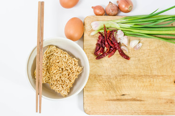 Tasty instant noodles in bowl isolated on white