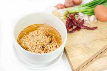 Tasty instant noodles in bowl isolated on white