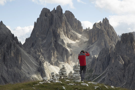 Photographer in Dolomite Mountains