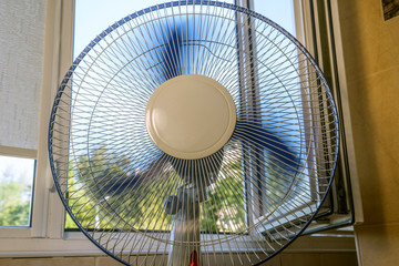 fan near an open window