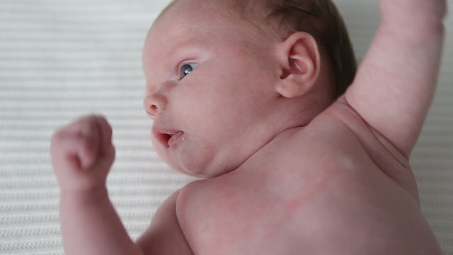 little newborn baby on a blanket