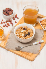 Granola, honey, nuts and raisins