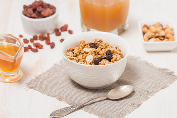 Granola, honey, nuts and raisins