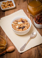 Granola, honey, nuts and raisins