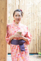Asian woman wearing yukata in onsen series
