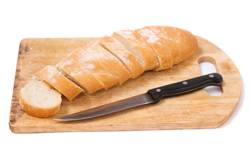 Sliced bread on a wooden chopping board