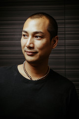 Portrait of skinhead Thai man