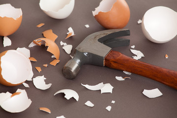 Hammer next to a bunch of cracked shells