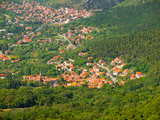 Italian village in green landscape