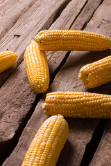 Cobs of corn scattered. © margostock
