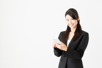 asian businesswoman using smart phone on white background