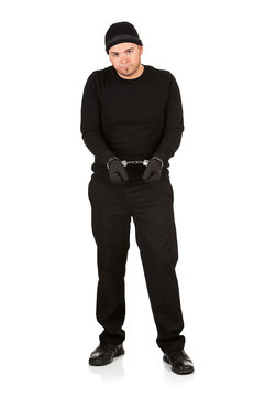 Burglar: Wearing Handcuffs