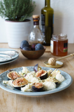 Starter of italian mozzarella cheese and fresh figs. Selective focus