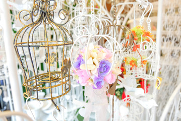 Decoration of colorful flower in cage