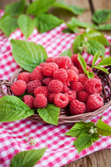  Ripe raspberry with leaf