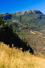 Fototapeta na wymiar Ski trails during fall foliage.