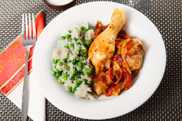 Chicken with rice and tomato sauce