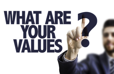 Business man pointing the text: What Are Your Values?