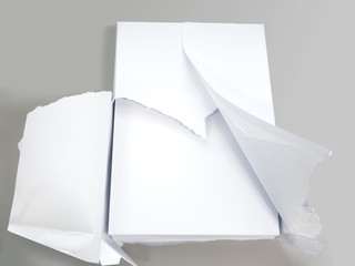 white plain office paper on grey background
