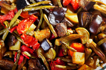 Casserole with eggplants, potatoes and zucchini