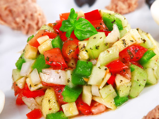 Tunisian salad with tomatos, cucumbers and tuna