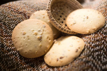 Chocolate chip cookies place on tribal style fabric