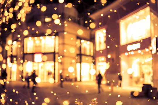 Shopping mall blur background with holiday lights