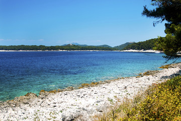 Turquoise blue lagoon on the island of Losinj, Croatia, seaside landscape
