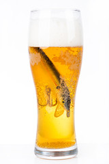 fishing bait wobbler in glass with beer