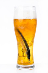 fishing bait wobbler in glass with beer