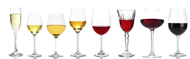 Wineglasses with different wine, isolated on white