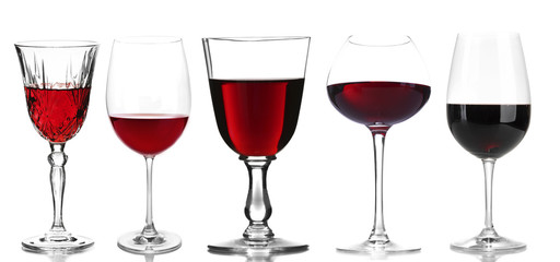 Wineglasses with different wine, isolated on white