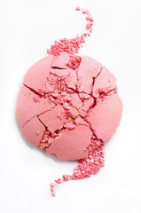 Pink, crushed eye shadow on white