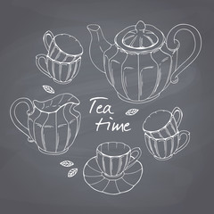 Hand drawn tea porcelain service set. Chalkboard background