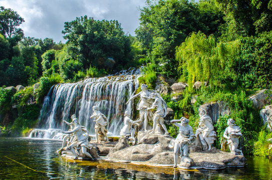 2 kilometers long promenade leading through gardens of imperial palace in caserta is decorated by many fountains and statues from bernini and ends by artificial waterfall.
