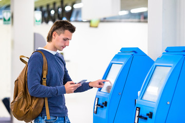 Display at self-service transfer machine, doing self-check-in