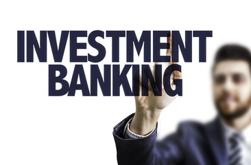 Business man pointing the text: Investment Banking
