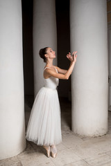 Russian ballerina posing outdoors
