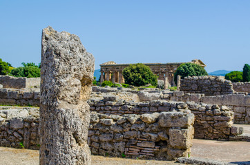 View over pile of stones situated in ancient ruin complex in Paestum