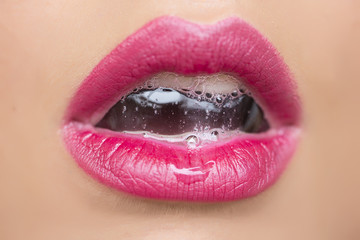 Female mouth with bubble