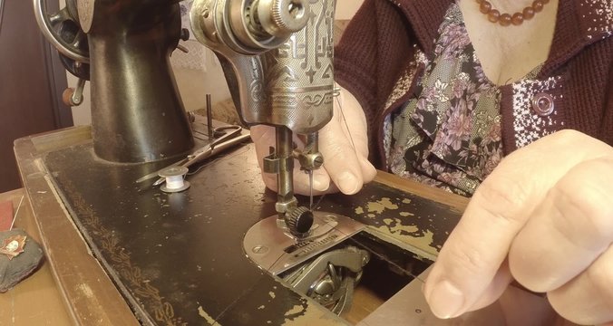 grandmother sews a red flag on an old sewing machine of the Soviet Union retro
RAW format for color correction
See the entire collection - many super close-ups