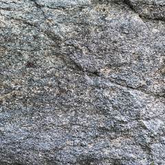 Untreated natural granite background texture wall.