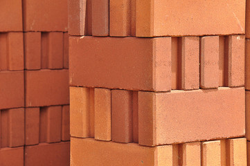 Light and shade of red clay bricks stack