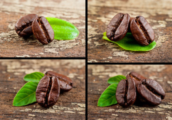 Coffee grains and green leaf on grunge wooden background