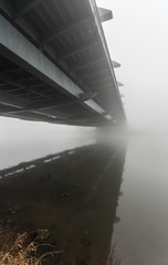 Kotlarski bridge in Krakow, Poland, during heavy fog - the longest humpbacked (arch) bridge in Poland without support in the river bottom.