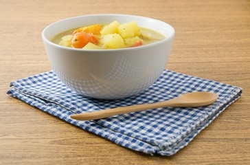 Vegetable Soup with Potato and Tomato in White Bowl