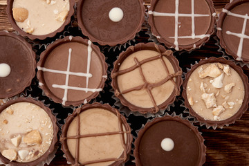 Dark chocolate on wooden background