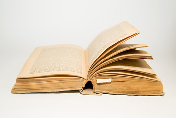 Obraz premium Open old book on a white background