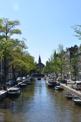 Fototapeta premium Church and canal in Amsterdam